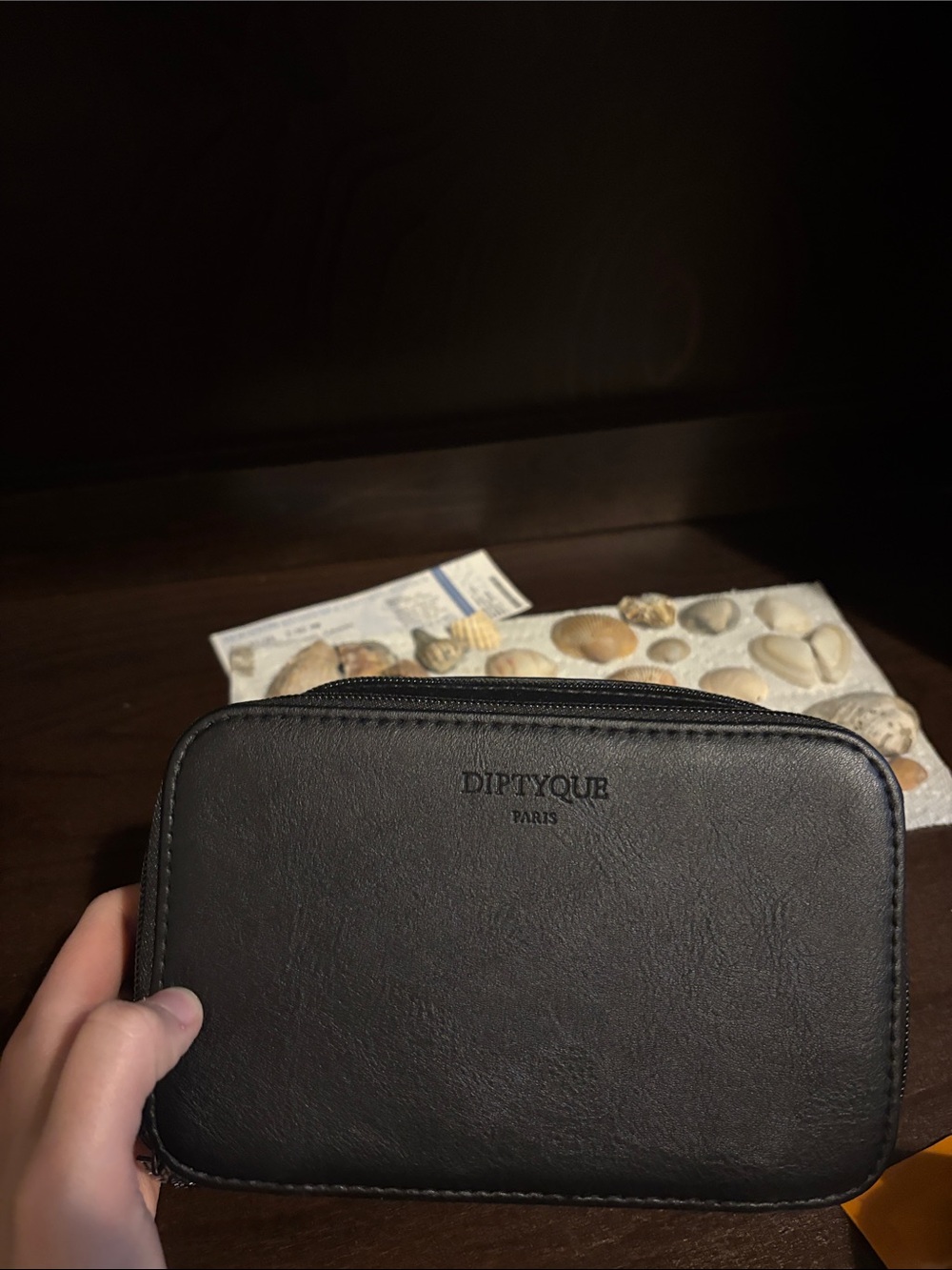 diptyque Black Leather Pouch and toiletries